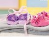 BABY born® Baby Schuhe in zwei unterschiedlichen Designs.
